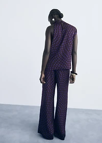 Polka dots flare trousers