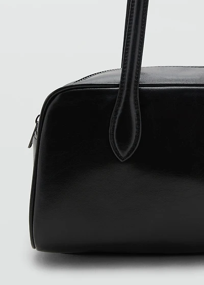 Bowling bag with faux-leather finish