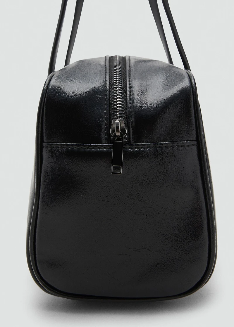 Bowling bag with faux-leather finish