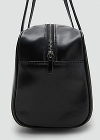 Bowling bag with faux-leather finish