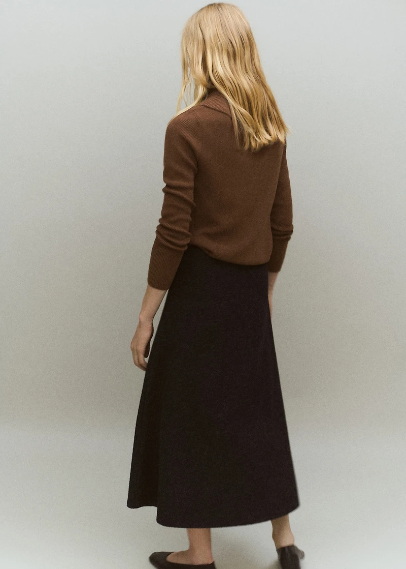 Sweater with asymmetrical neck and buttons