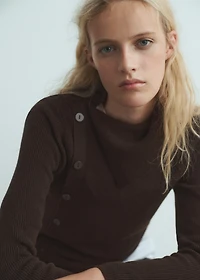 Sweater with asymmetrical neck and buttons