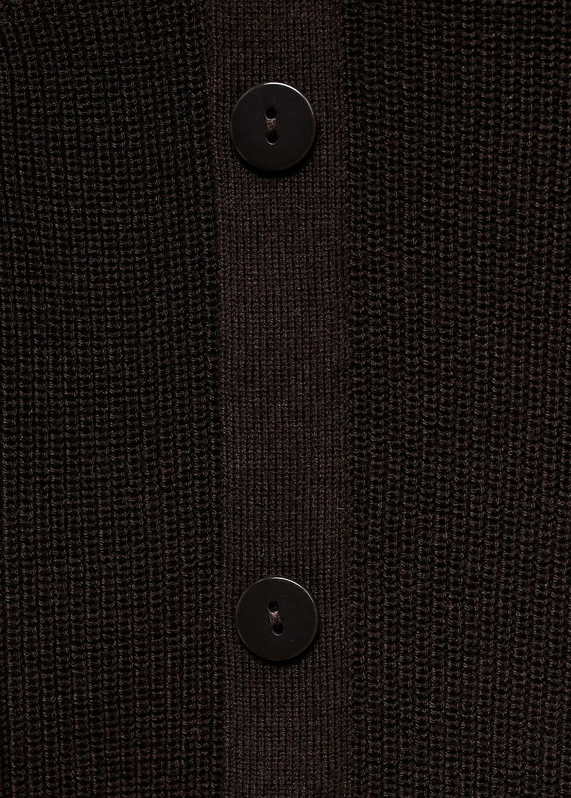 Sweater with asymmetrical neck and buttons