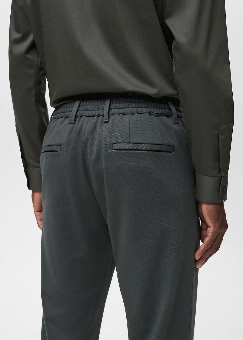 Stretch fabric slim-fit pants with drawstring