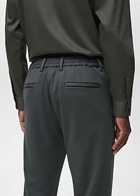 Stretch fabric slim-fit pants with drawstring
