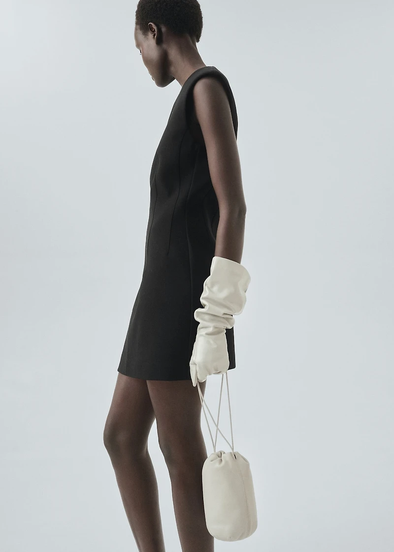 Dress with stitched pocket