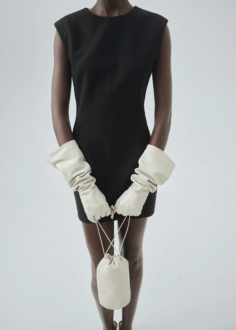 Dress with stitched pocket