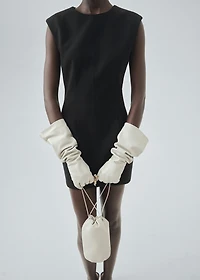 Dress with stitched pocket