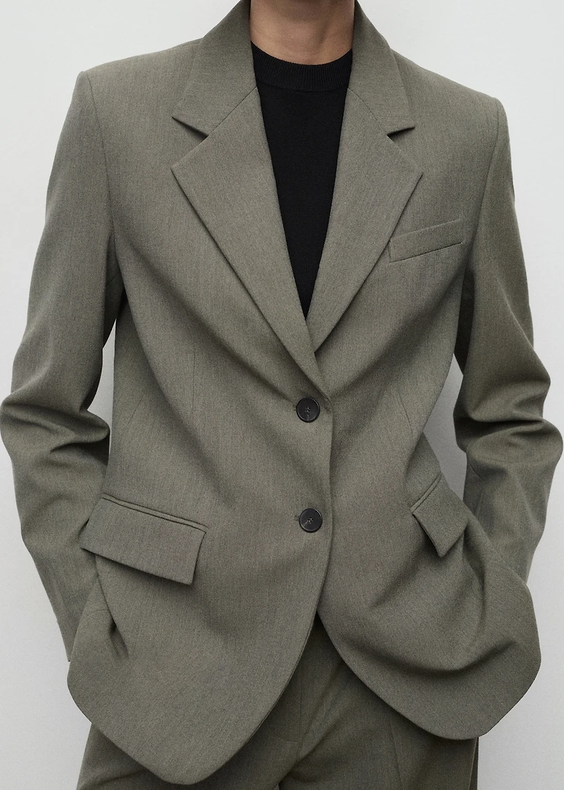Suit blazer with flap pockets