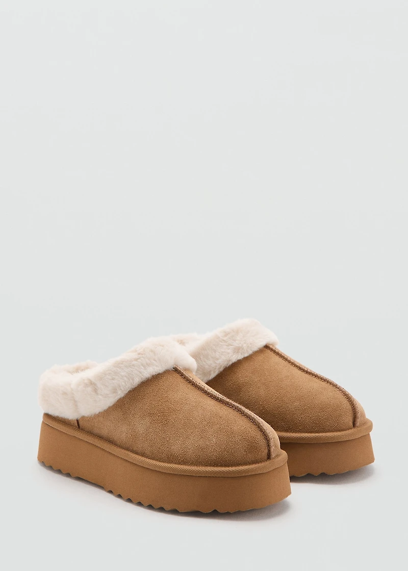 Platform clogs with sheepskin lining