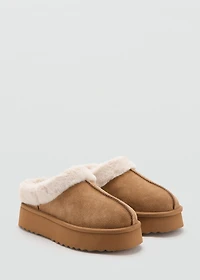 Platform clogs with sheepskin lining