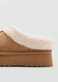 Platform clogs with sheepskin lining