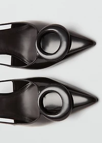 Patent leather high-heeled shoes with ring detail