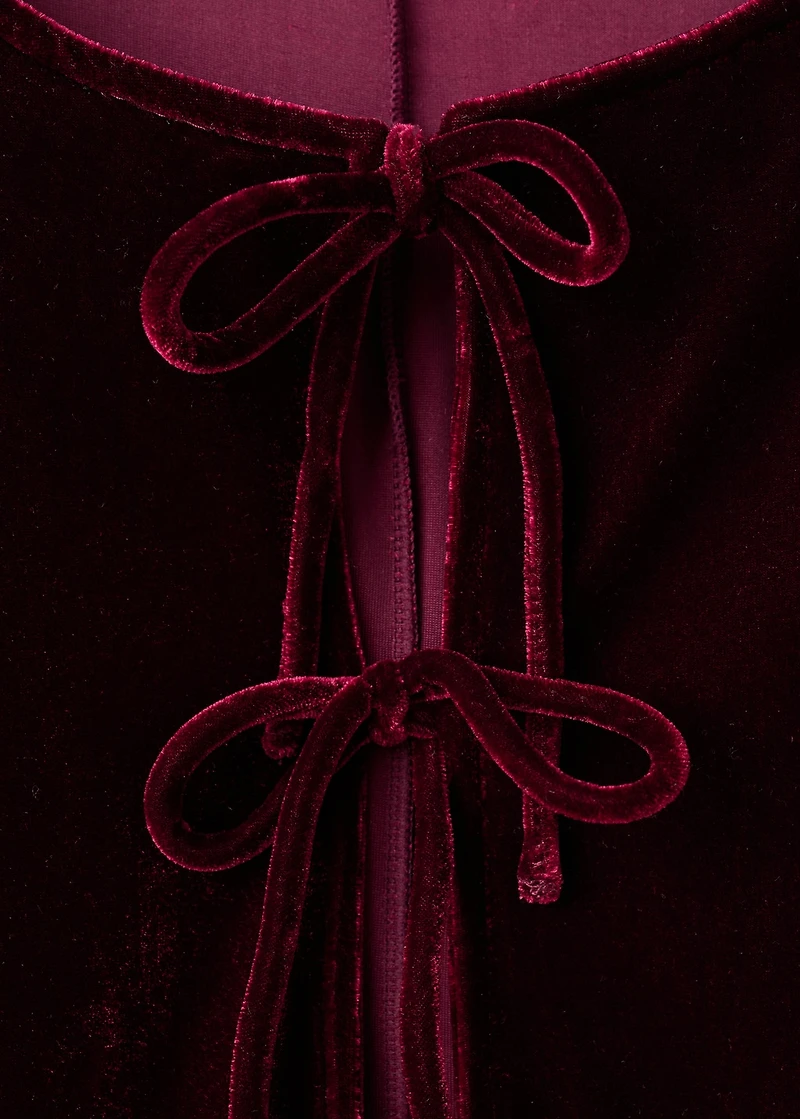 Velvet blouse with bows