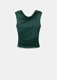 Semi-transparent top with asymmetrical neckline