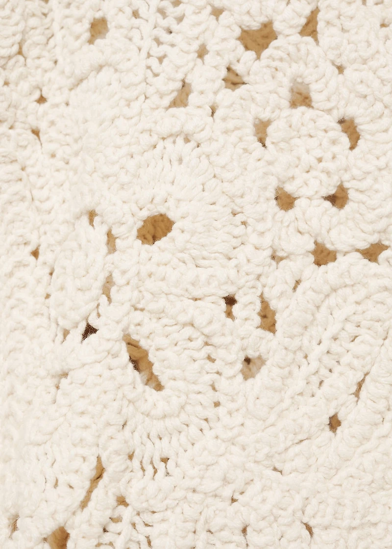 Knitted jacket with scalloped hem