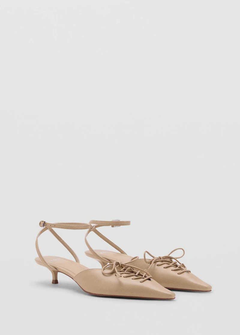 Lace-up high heel shoes