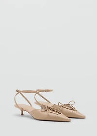 Lace-up high heel shoes