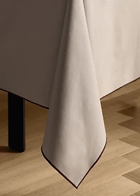 Resin-coated cotton tablecloth with overlock stitching for 6 to 8 diners