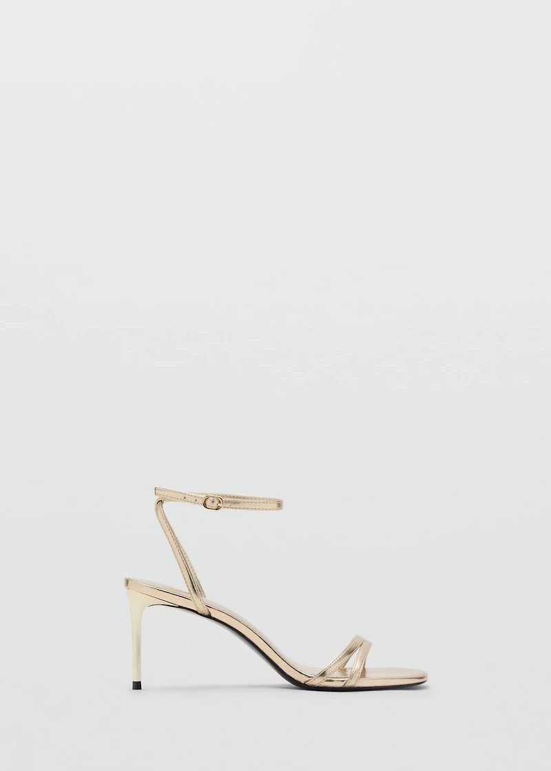 Heeled sandals with straps