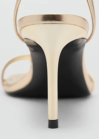 Heeled sandals with straps