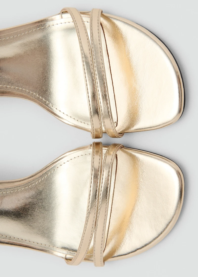 Heeled sandals with straps