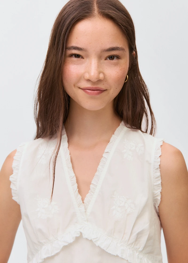 Ruffled embroidered blouse