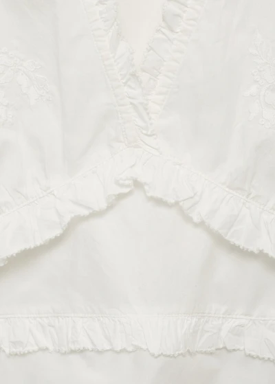 Ruffled embroidered blouse