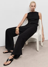Long jumpsuit with belt and buckle