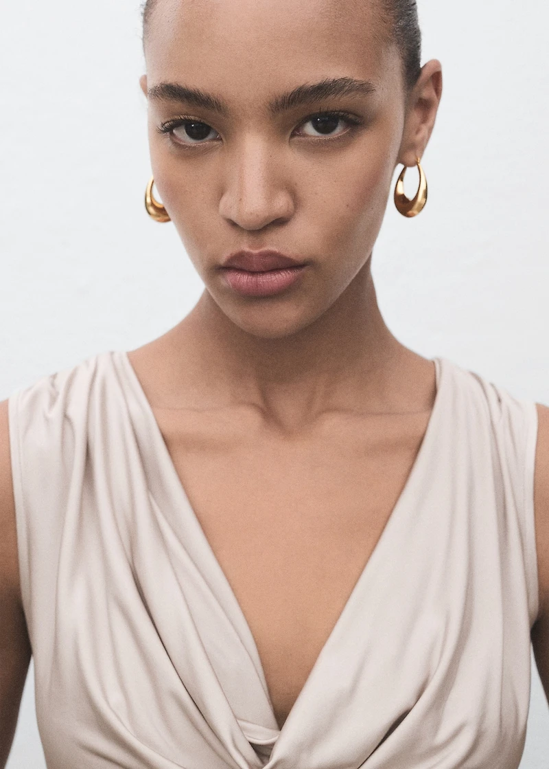 Bodysuit with draped neckline