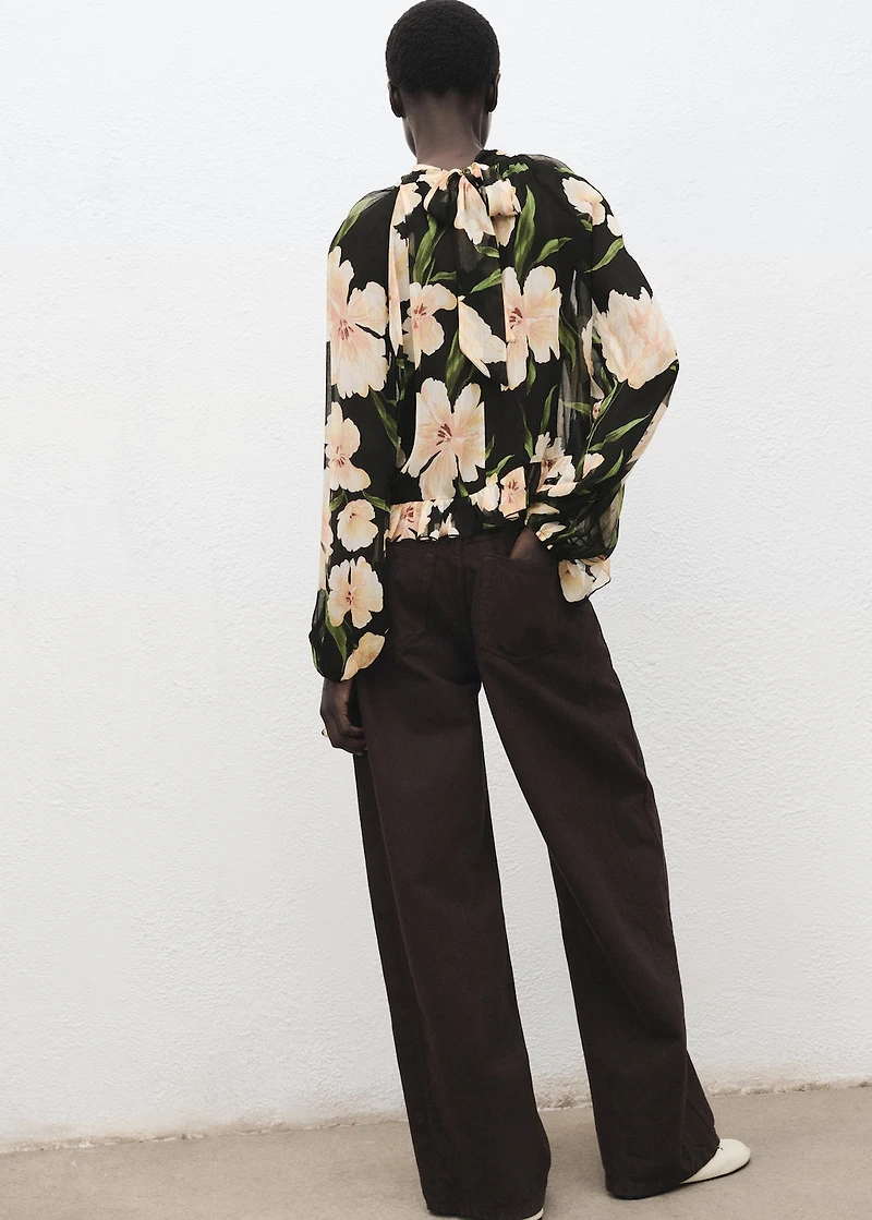 Semi-transparent floral blouse