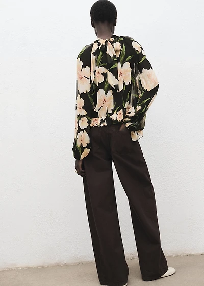 Semi-transparent floral blouse