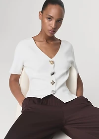 Knitted cardigan with jewel button