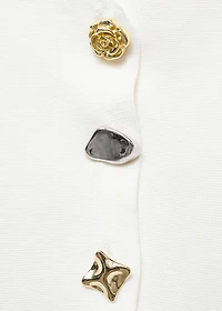 Knitted cardigan with jewel button