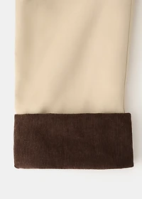 Trench coat with contrasting collar