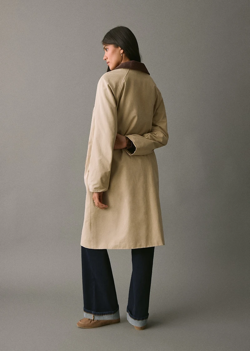 Trench coat with contrasting collar