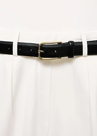 Combined-fabric jumpsuit with belt