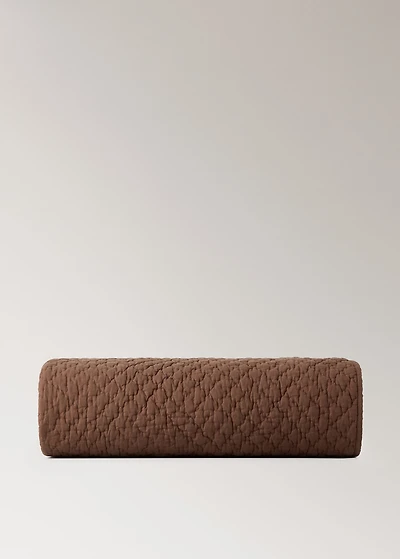 Hand-stitched cotton bedspread for cot