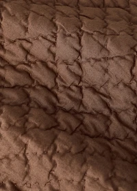 Hand-stitched cotton bedspread for cot