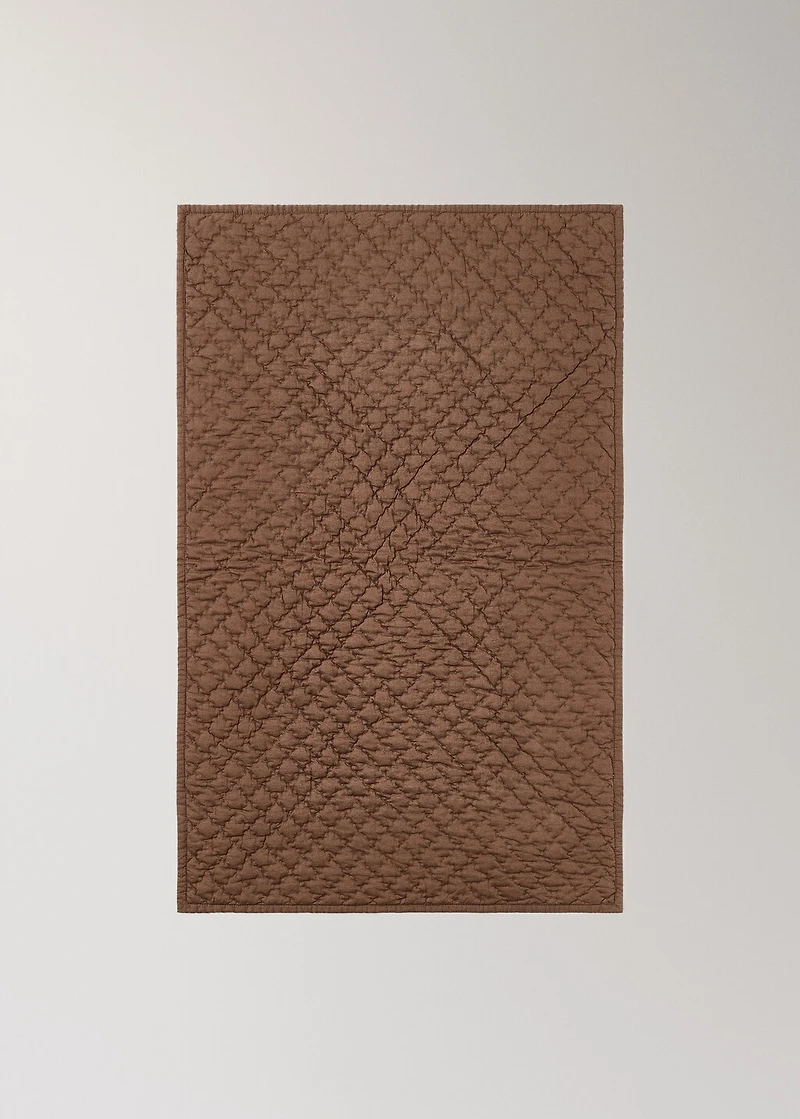 Hand-stitched cotton bedspread for cot