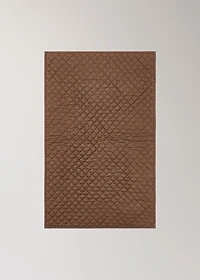 Hand-stitched cotton bedspread for cot