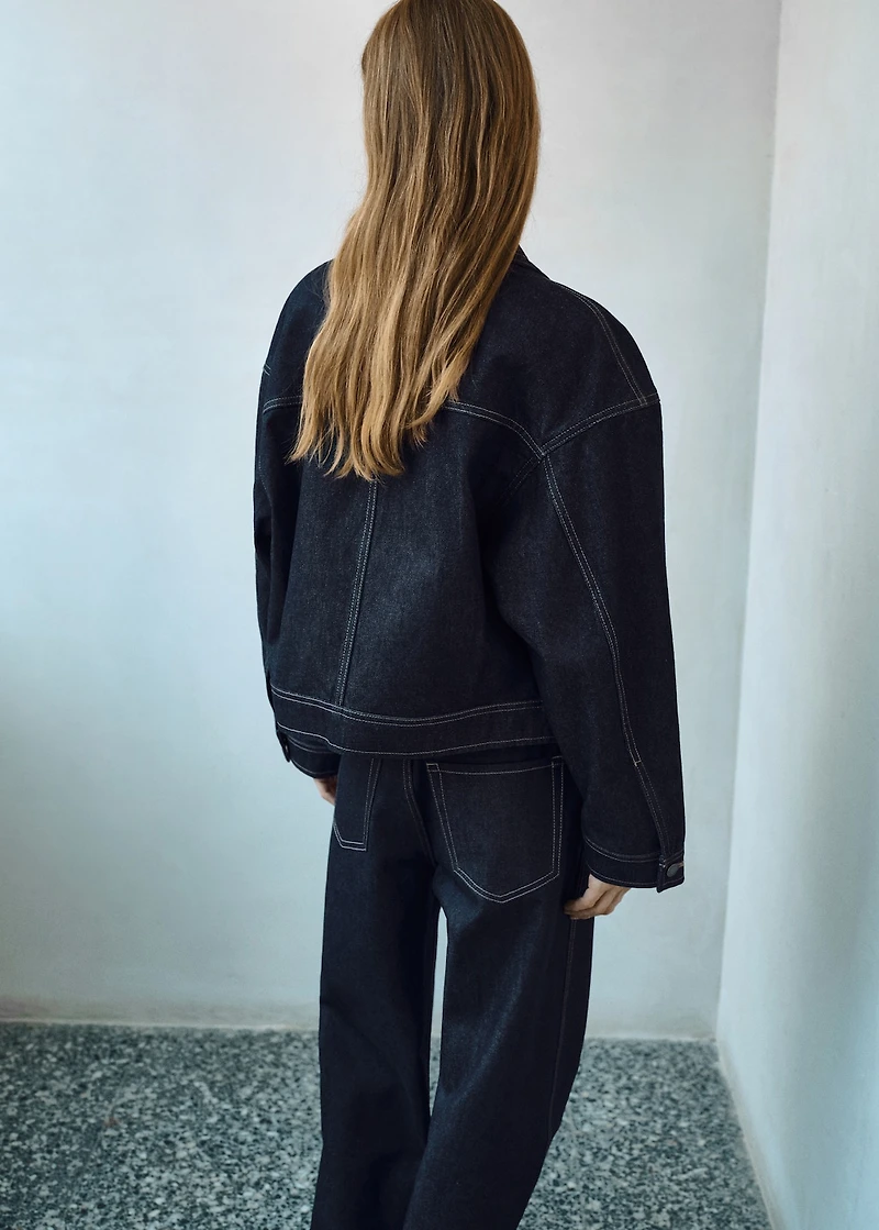 Denim jacket with decorative stitching