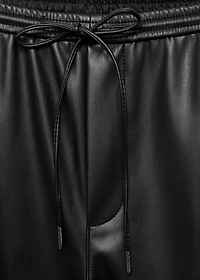 Faux-leather pants with elastic waist