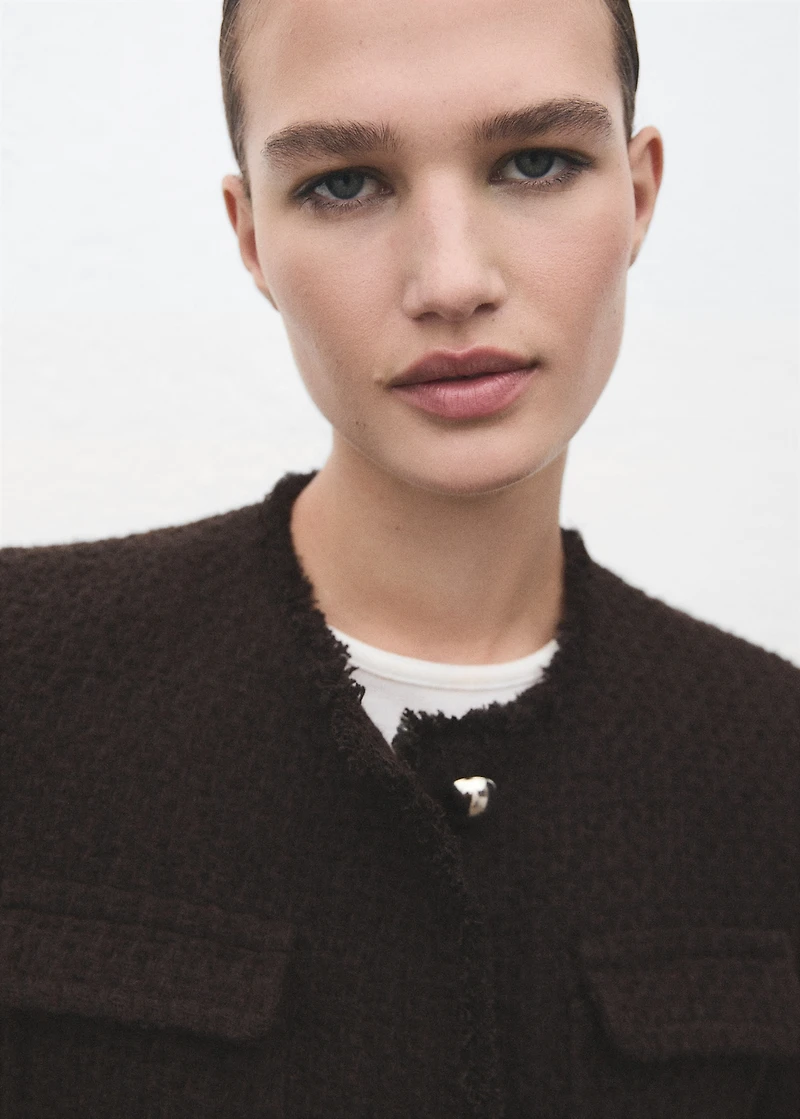 Tweed jacket with frayed ends