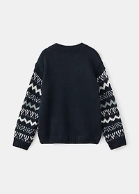 Knitted sweater with trim