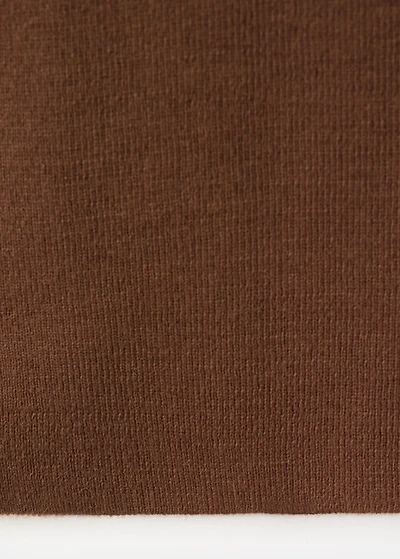 Knitted top with studs