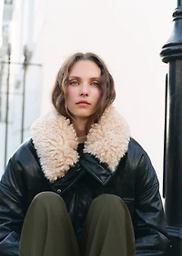 Pleated trousers with button detail