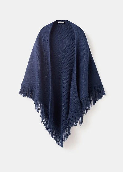 Knitted poncho with tassels