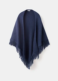 Knitted poncho with tassels