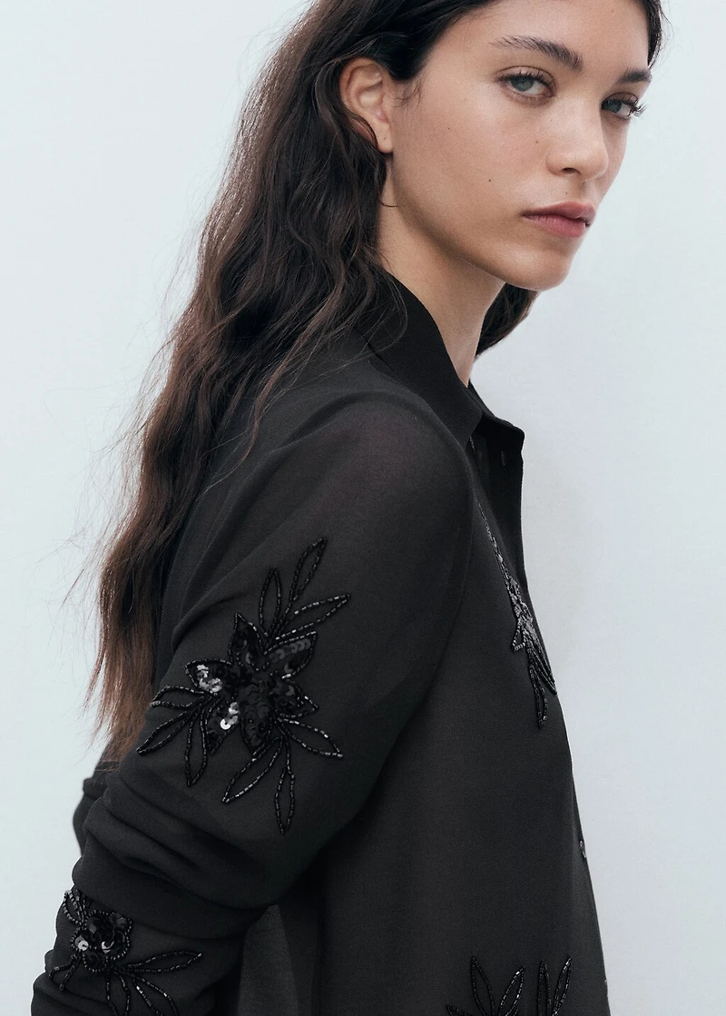 Semi-transparent shirt with rhinestone embroidery